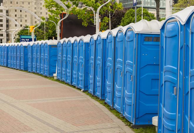 a row of portable restrooms at a fairground, offering visitors a clean and hassle-free experience in yeadon